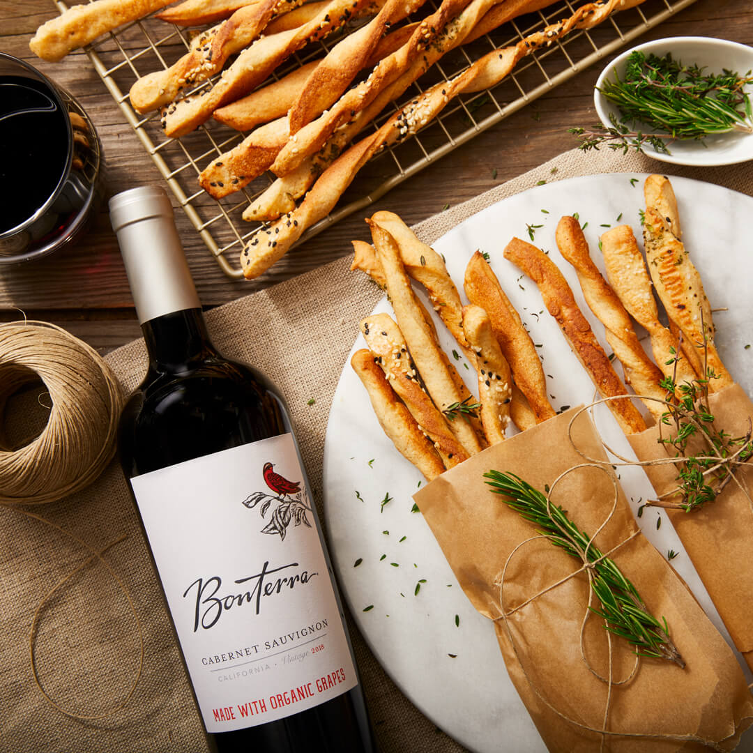 Bonterra Cabernet Sauvignon next to bundles of rustic breadsticks