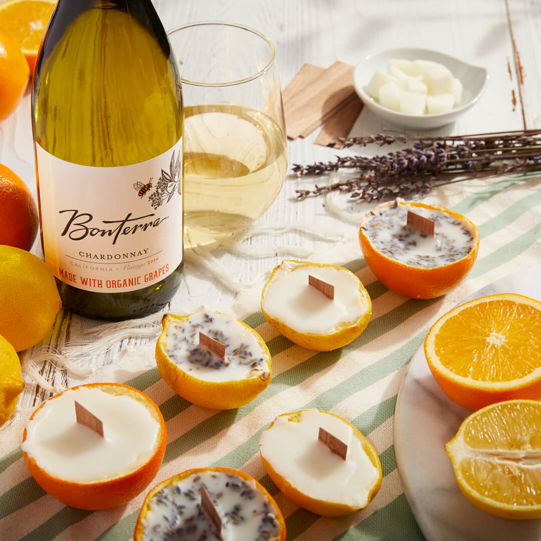 Bonterra Chardonnay with candles crafted from recycled orange peels