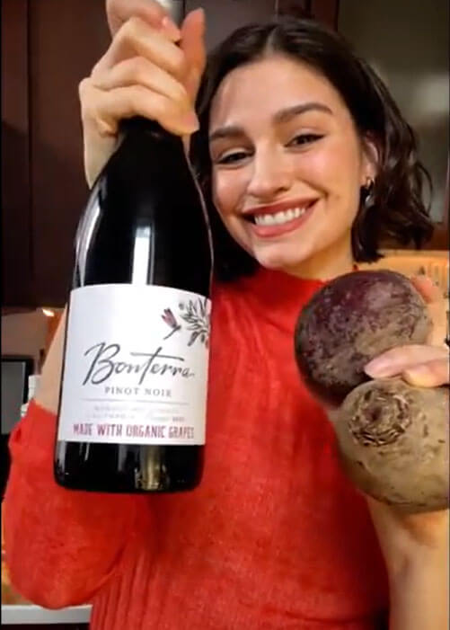 Gabrielle Chappel holding Bonterra Pinot Noir and Beets